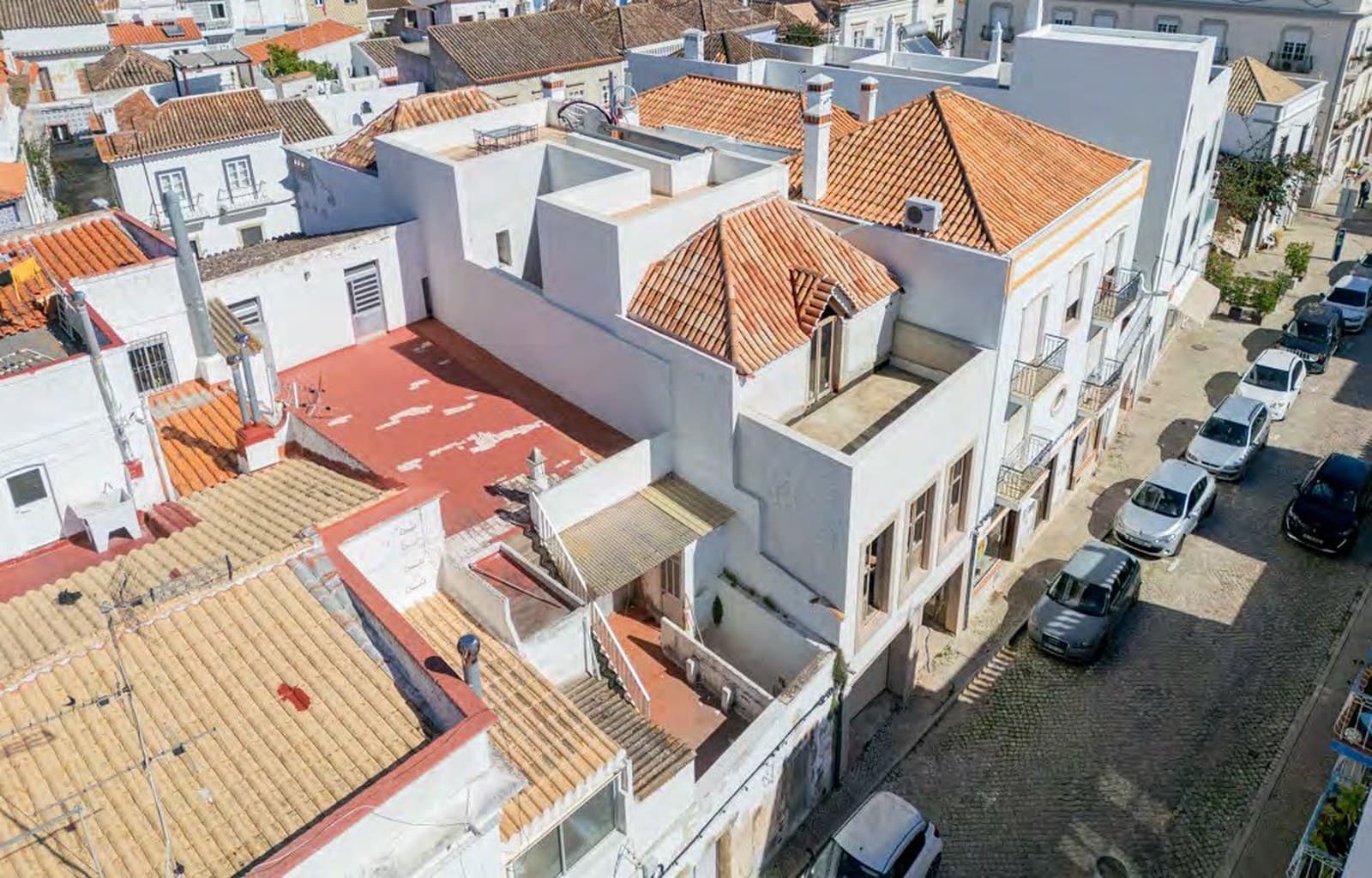 Aerial view of the Villa Borcklund rooftop terrace and surrounding rooftops