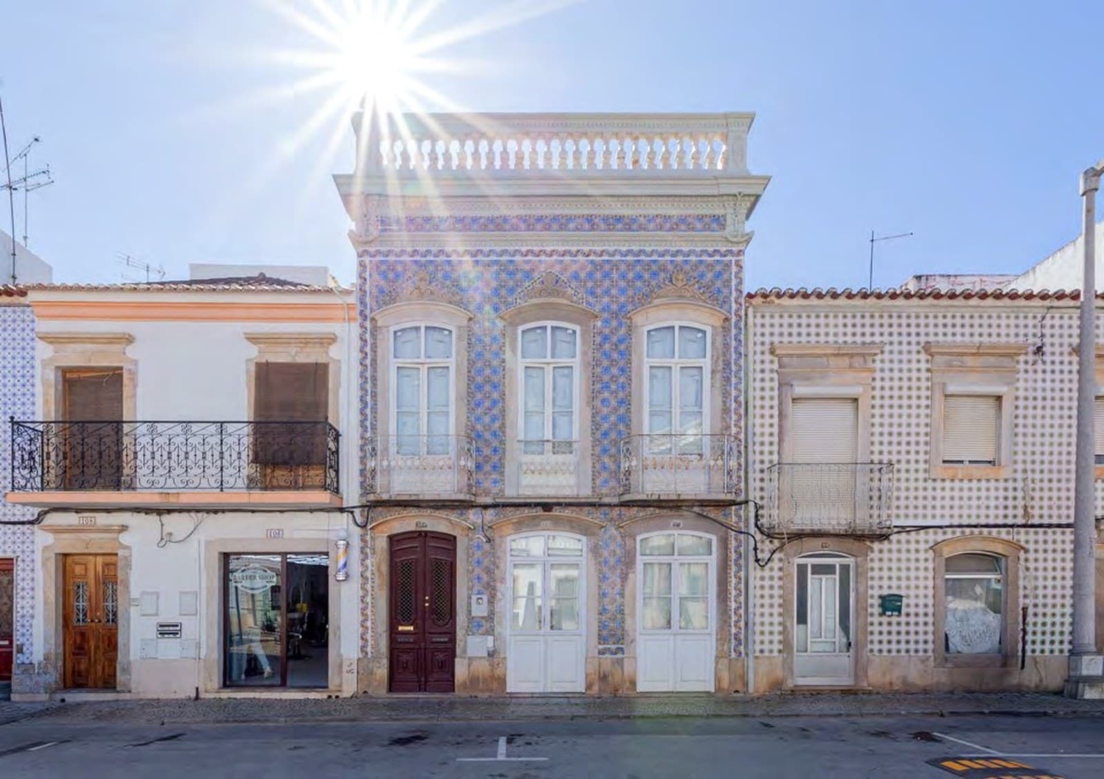 Full street-level view of the Villa Borcklund facade, Tavira